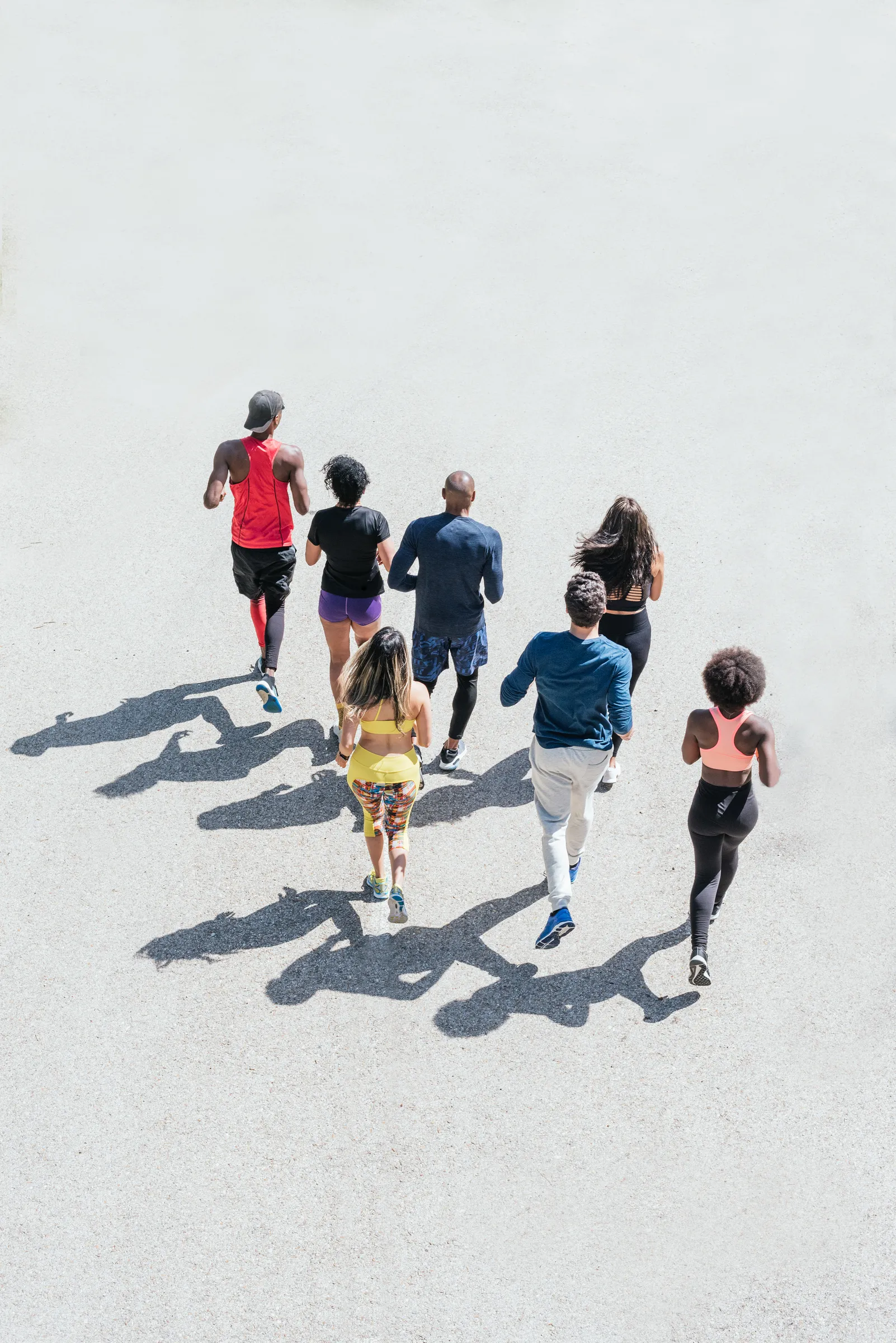Top-down view of group of runners training outdoors